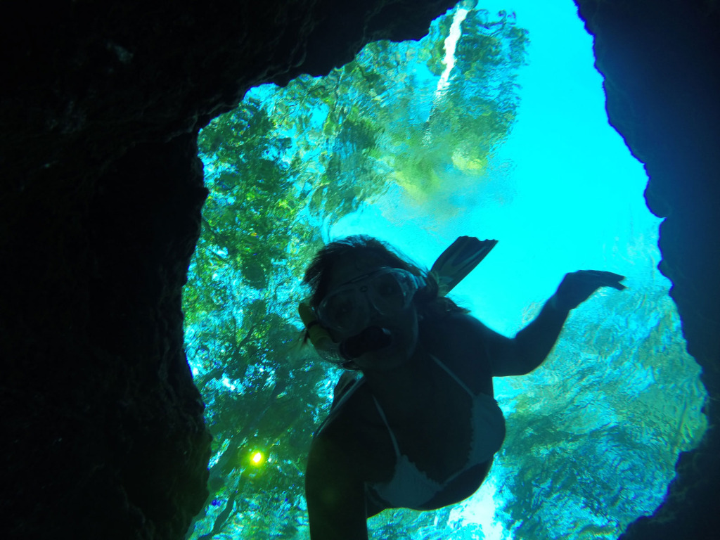 girl diving at Ginnie Springs FL