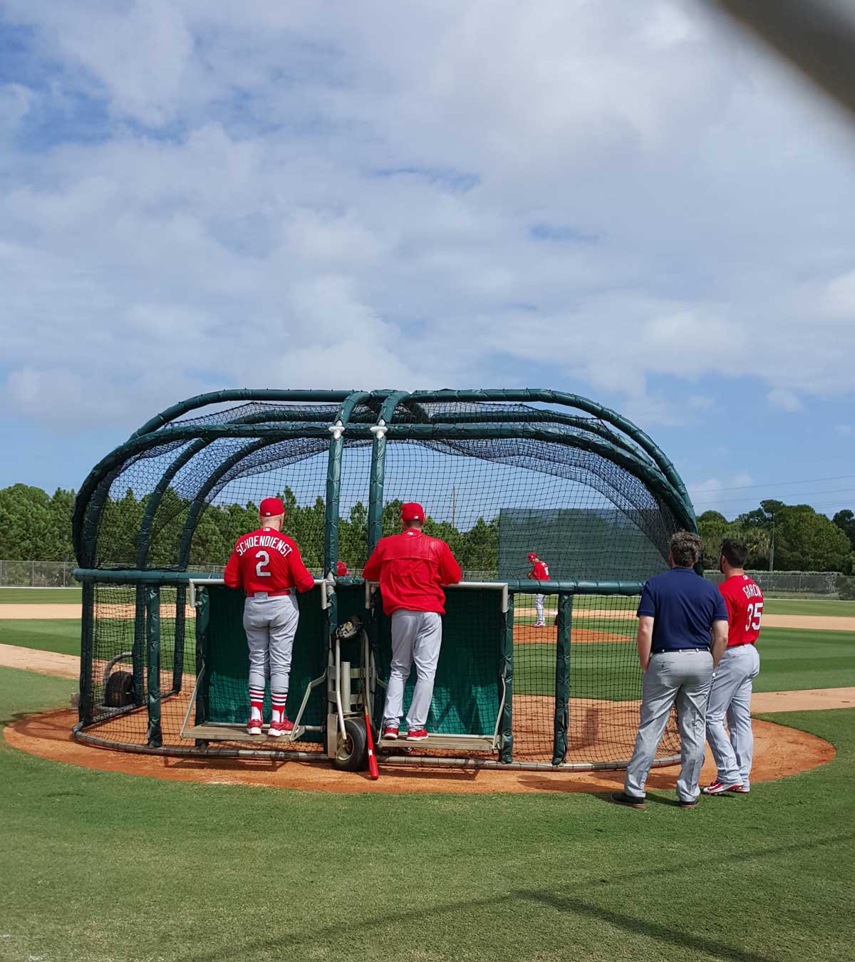 Red Schoendienst watches on during batting practice