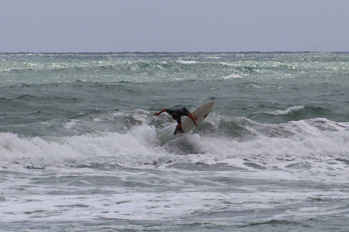 surfing near the juno beach pier 2