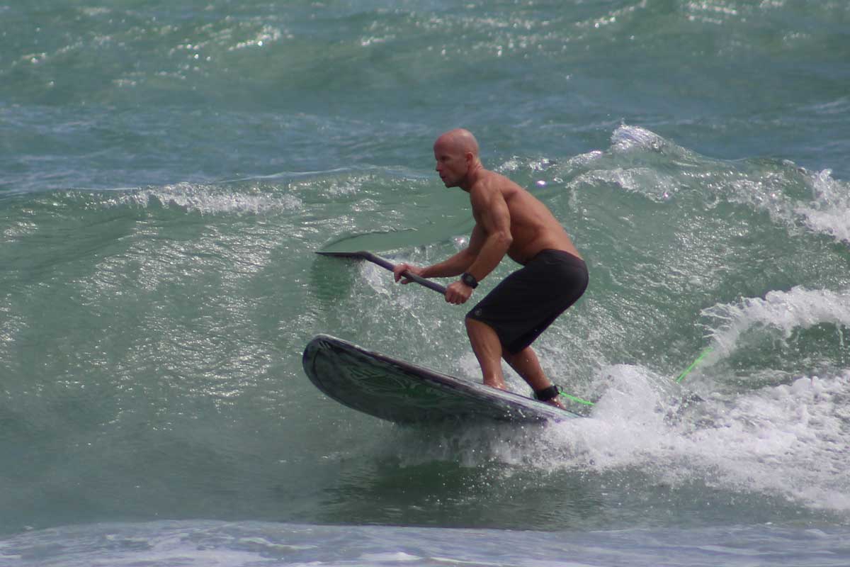 paddleboard surfing near the juno beach pier 